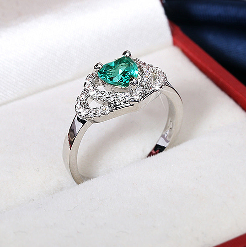 Anello cuore con zircone verde