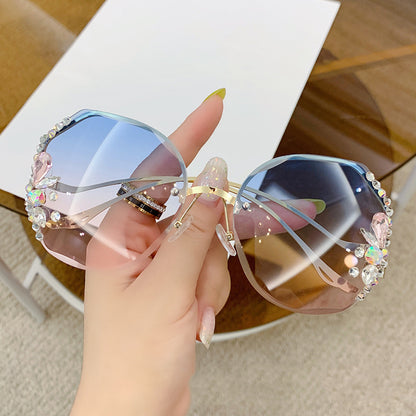 Occhiali da sole senza montatura con strass