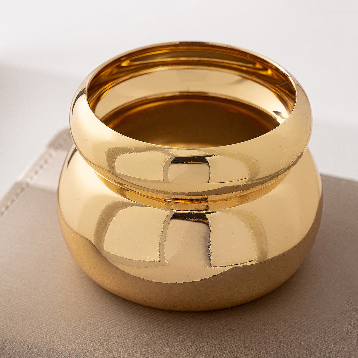 Bracciale tondo dorato