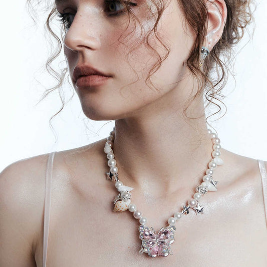 Collana charm farfalla e stella