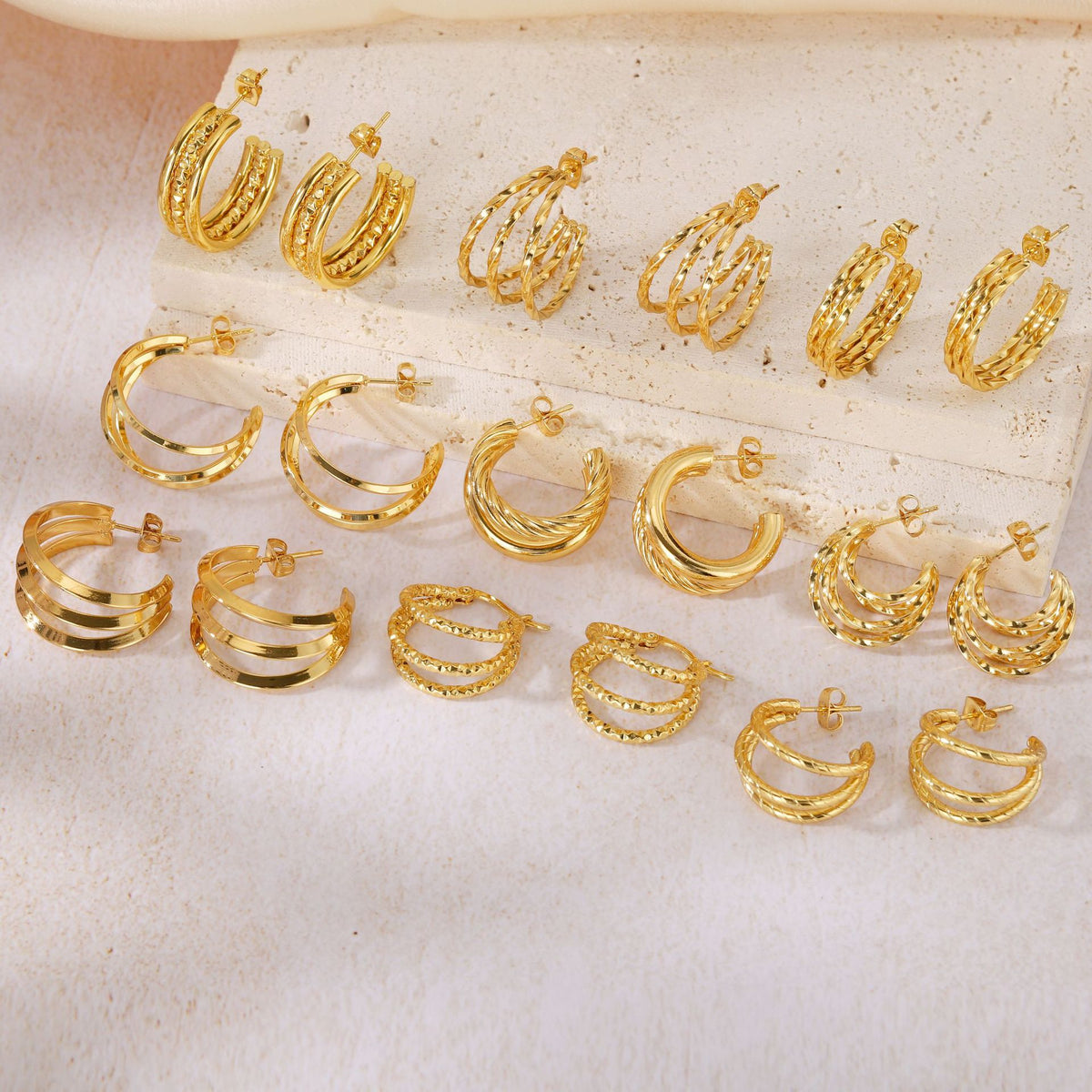 Orecchini linee geometriche intrecciate