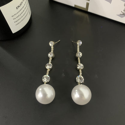 Orecchini lunghi eleganti