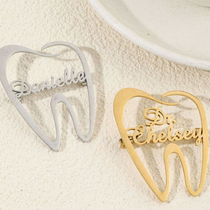 Spilla dente in acciaio inox