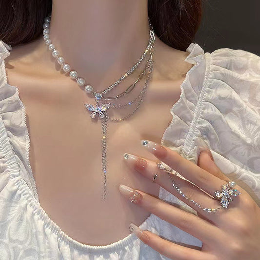 Collana perla farfalla nappina