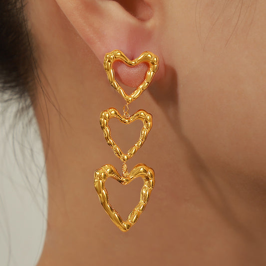 Orecchini cuore pesca titanio oro