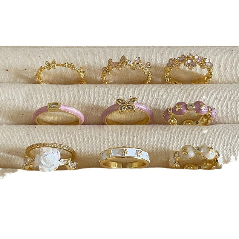 Anello farfalla e fiore viola