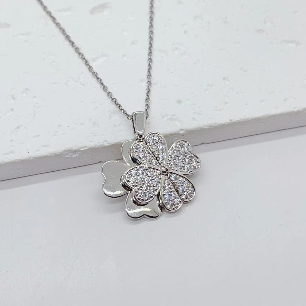 Collana acciaio titanio cuore farfalla girasole