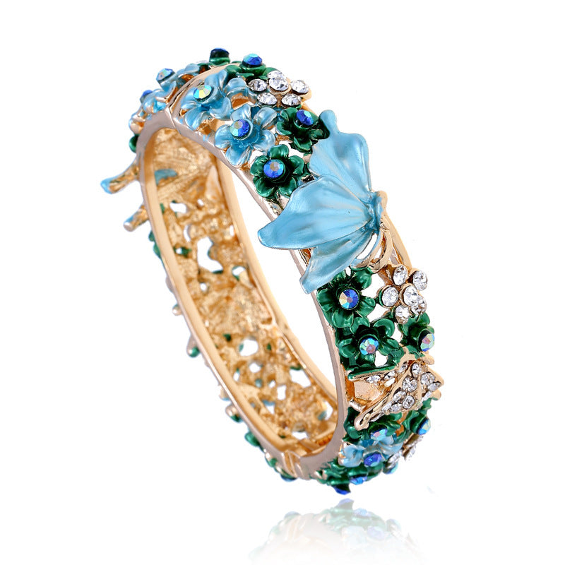 Bracciale farfalla e fiore aperto