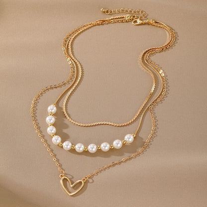 Collana cuore perle oro