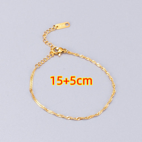 Bracciale titanio placcato oro a spira