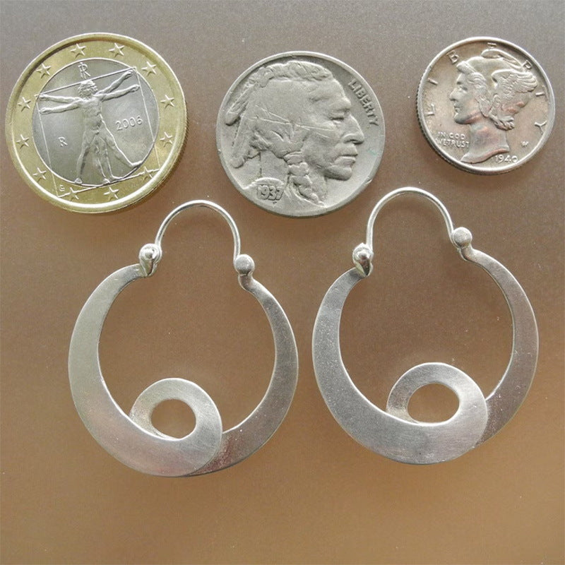 Orecchini curvi geometrici