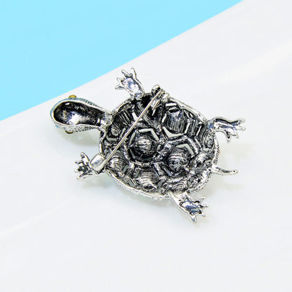 Spilla tartaruga con strass