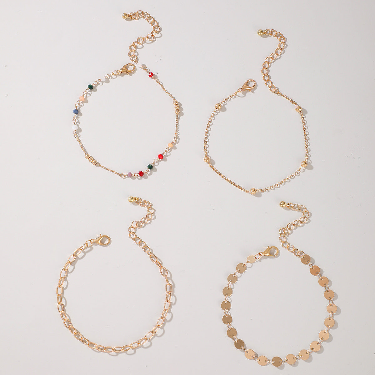 Cavigliera perline colorate set di 4