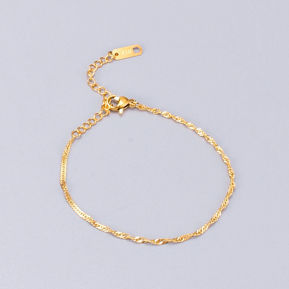 Bracciale titanio placcato oro a spira
