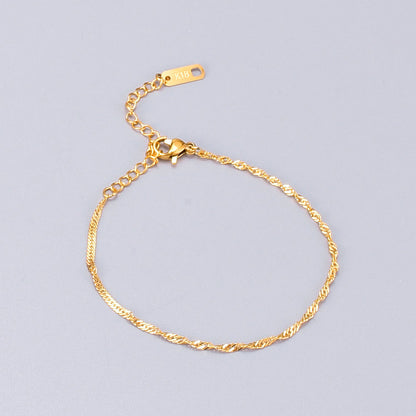 Bracciale titanio placcato oro a spira