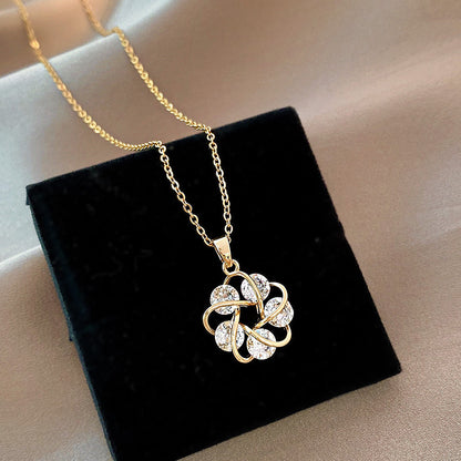 Collana fiore geometrico titanio