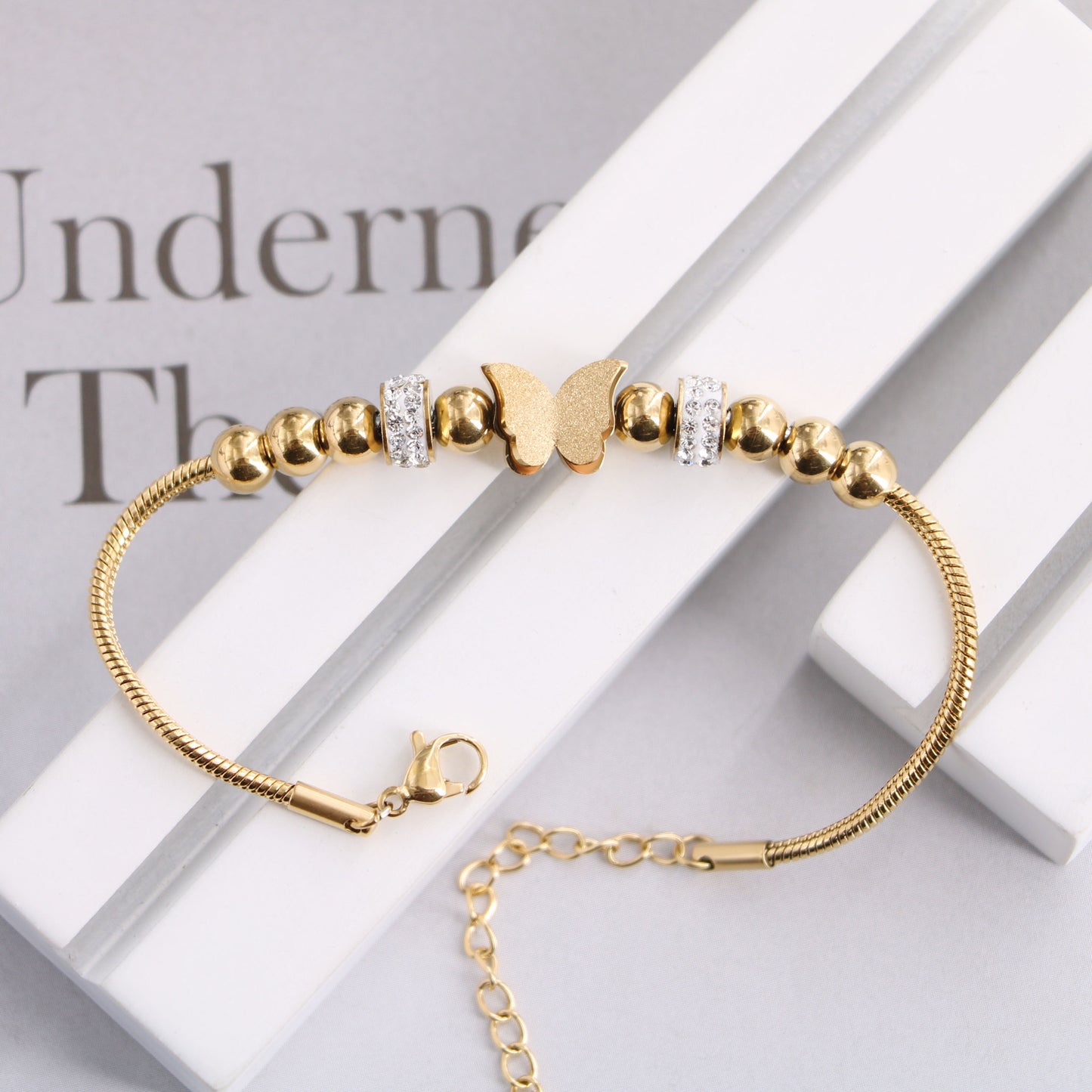 Bracciale farfalla sfere d'acciaio