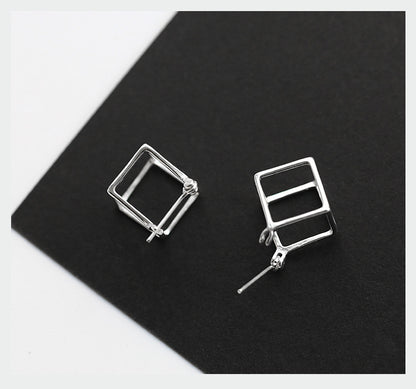 Orecchini cubi traforati argento