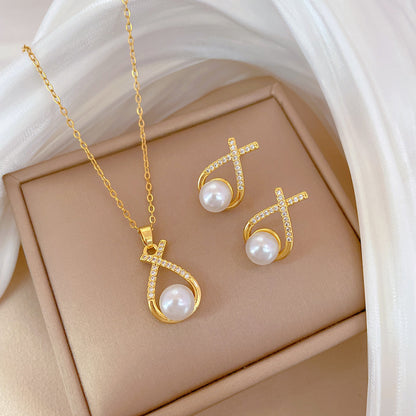 Collana croce con perla e strass