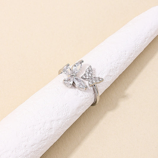 Anello farfalla aperto con zircone