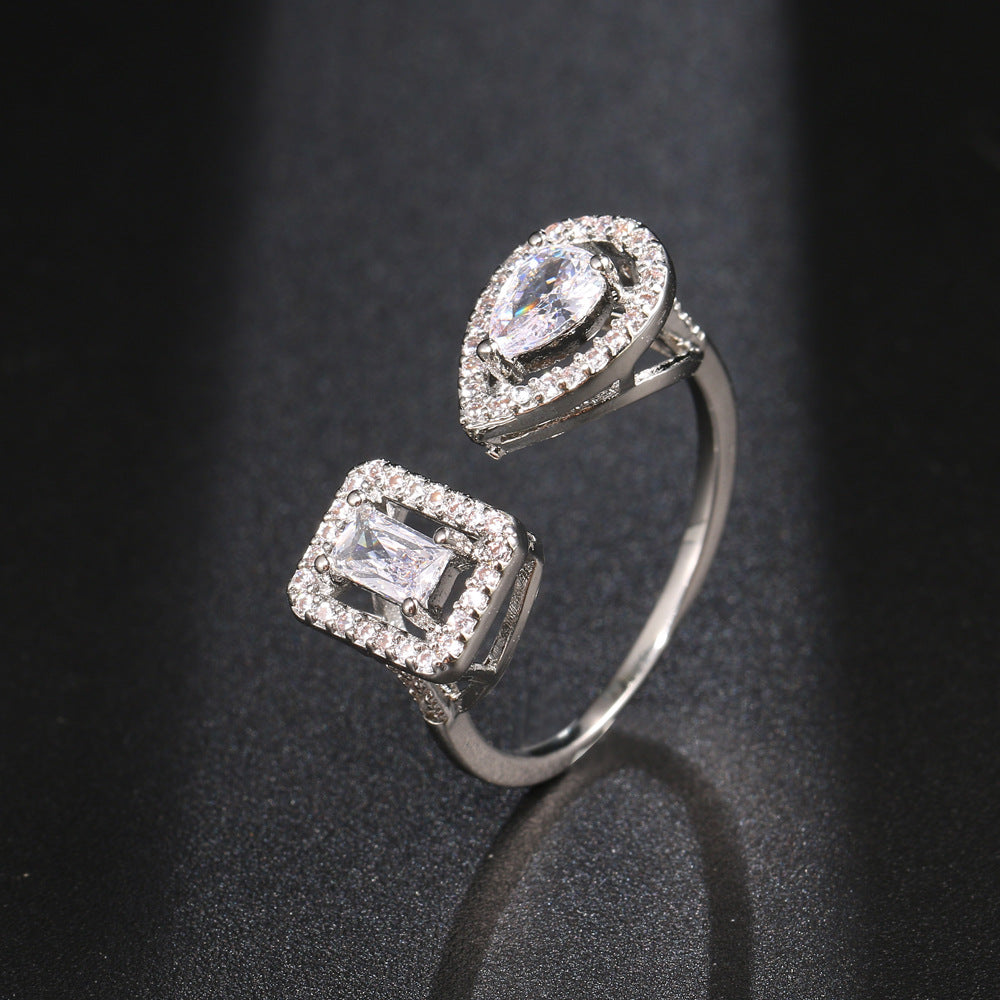 Anello zircone asimmetrico