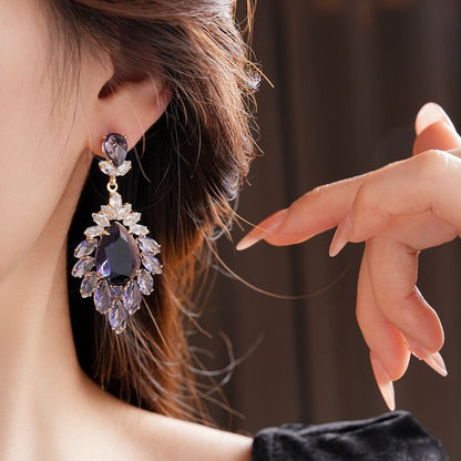 Orecchini fiore viola vintage