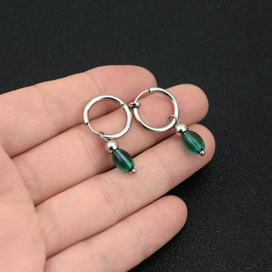 Clip orecchio titanio blu pavone