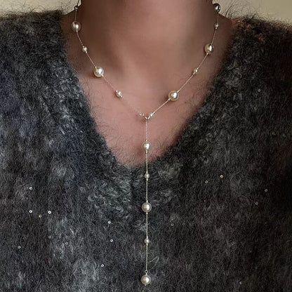 Collana lunga con perle