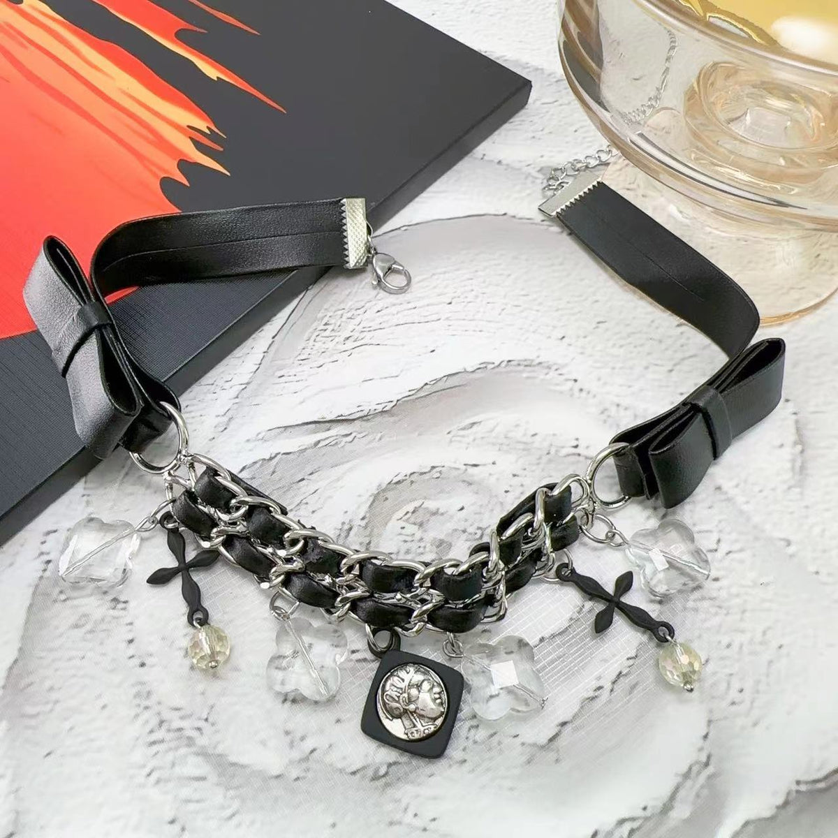 Collana croce pelle intrecciata