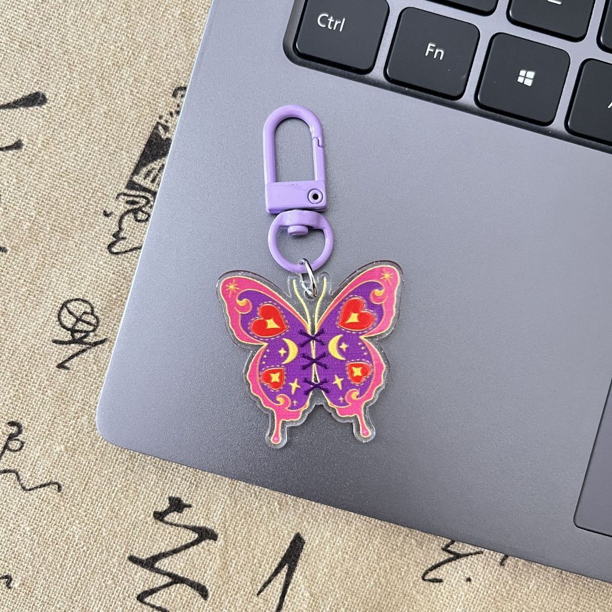 Charm cellulare doppio lato