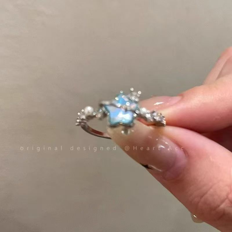 Anello stella e luna blu ghiaccio