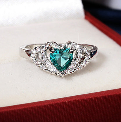 Anello cuore con zircone verde