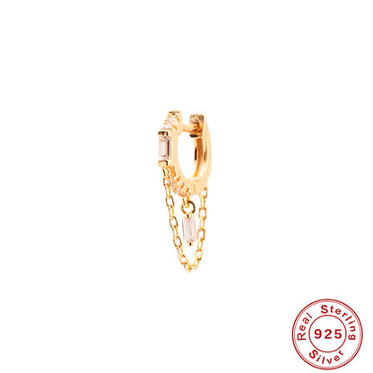 Orecchini geometrici zircone con nappina