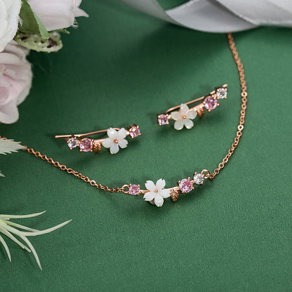 Orecchini farfalla e fiore con perla