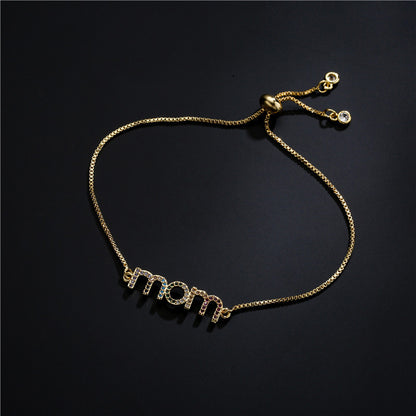 Braccialetto charm mamma oro