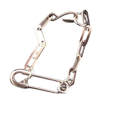 Bracciale geometrico con spilla