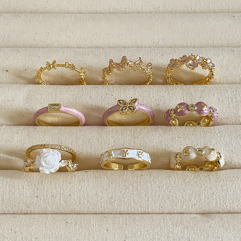 Anello farfalla e fiore viola