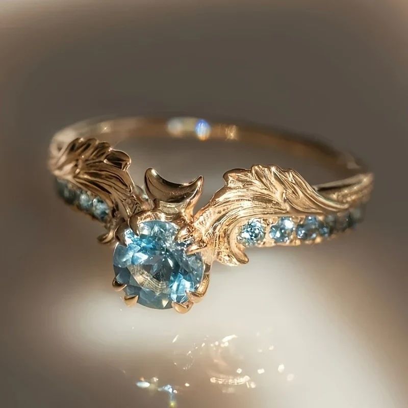 Anello ali zircone
