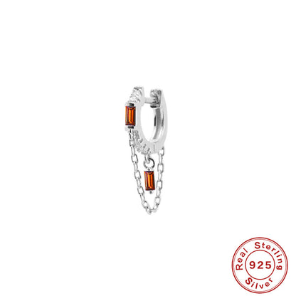 Orecchini geometrici zircone con nappina