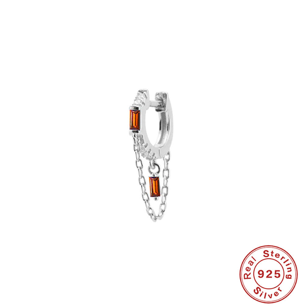 Orecchini geometrici zircone con nappina