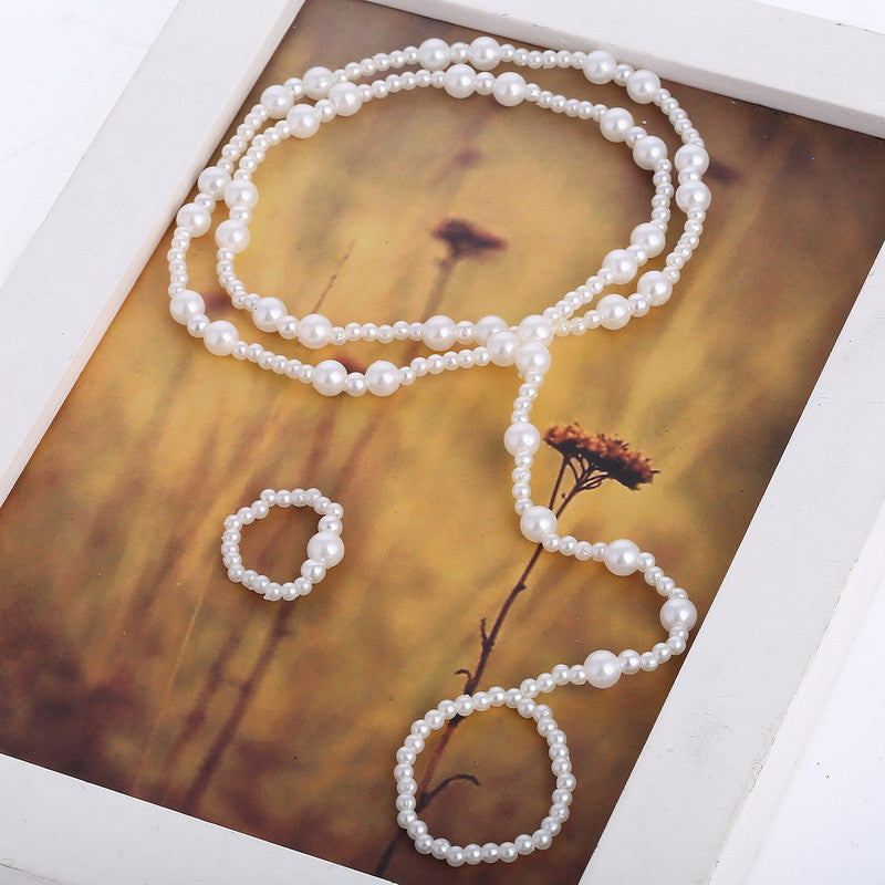 Set cavigliera e anello con perle