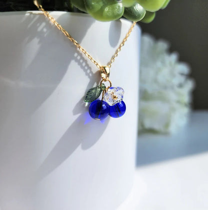 Collana ciliegia e mirtillo