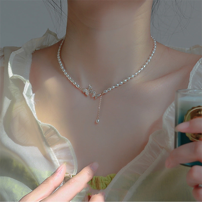 Collana farfalla con perla vintage