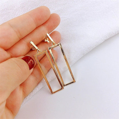 Orecchini geometrici fluidi
