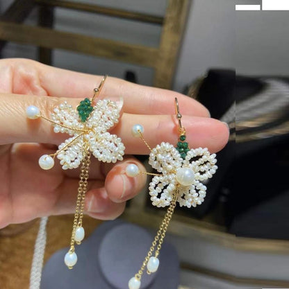 Orecchini farfalla perla con nappa