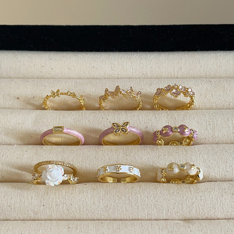 Anello farfalla e fiore viola