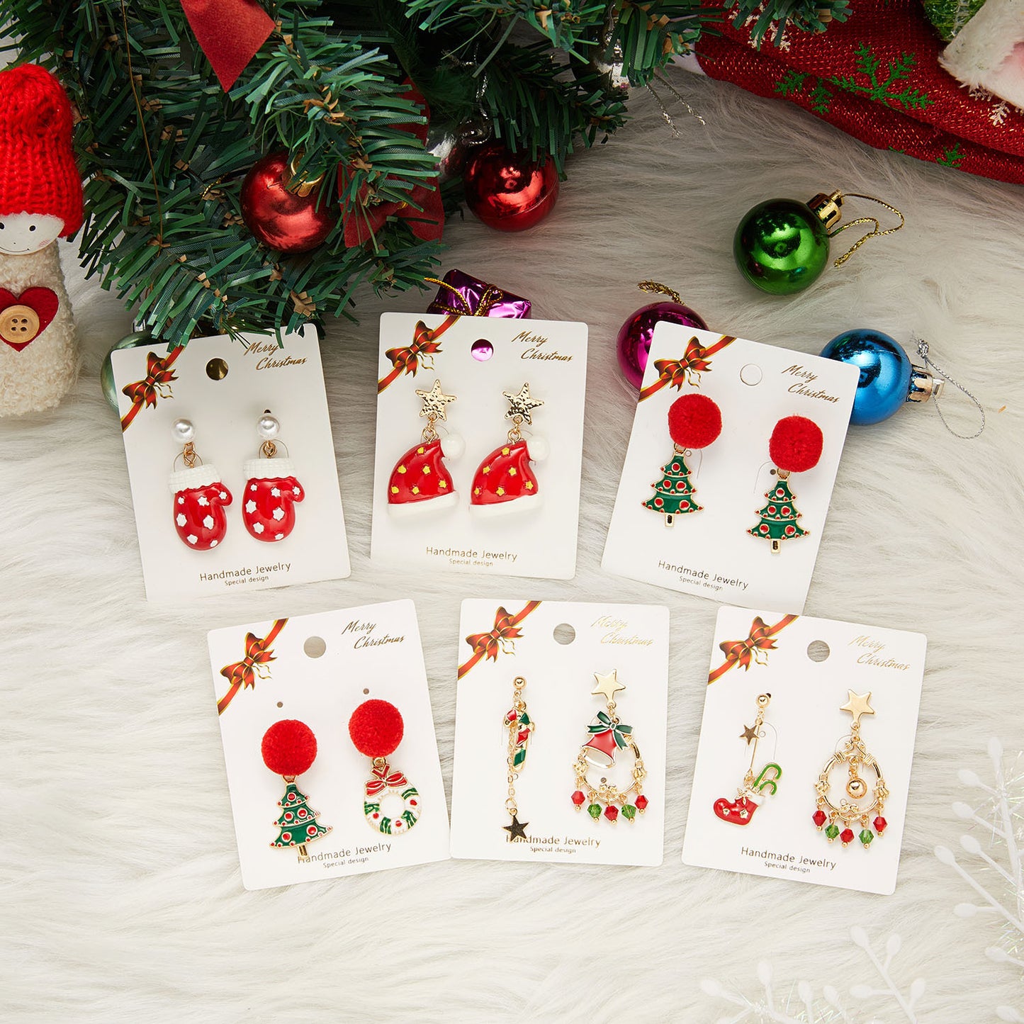 Orecchini natalizi asimmetrici albero