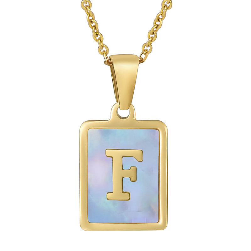 Collana titanio con lettera e conchiglia