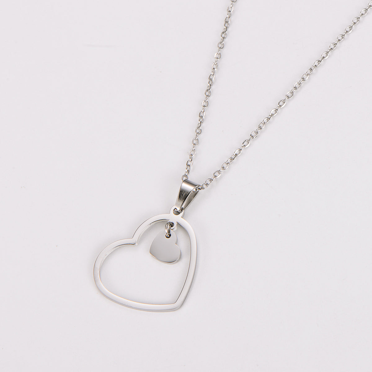 Collana doppio cuore minimalista