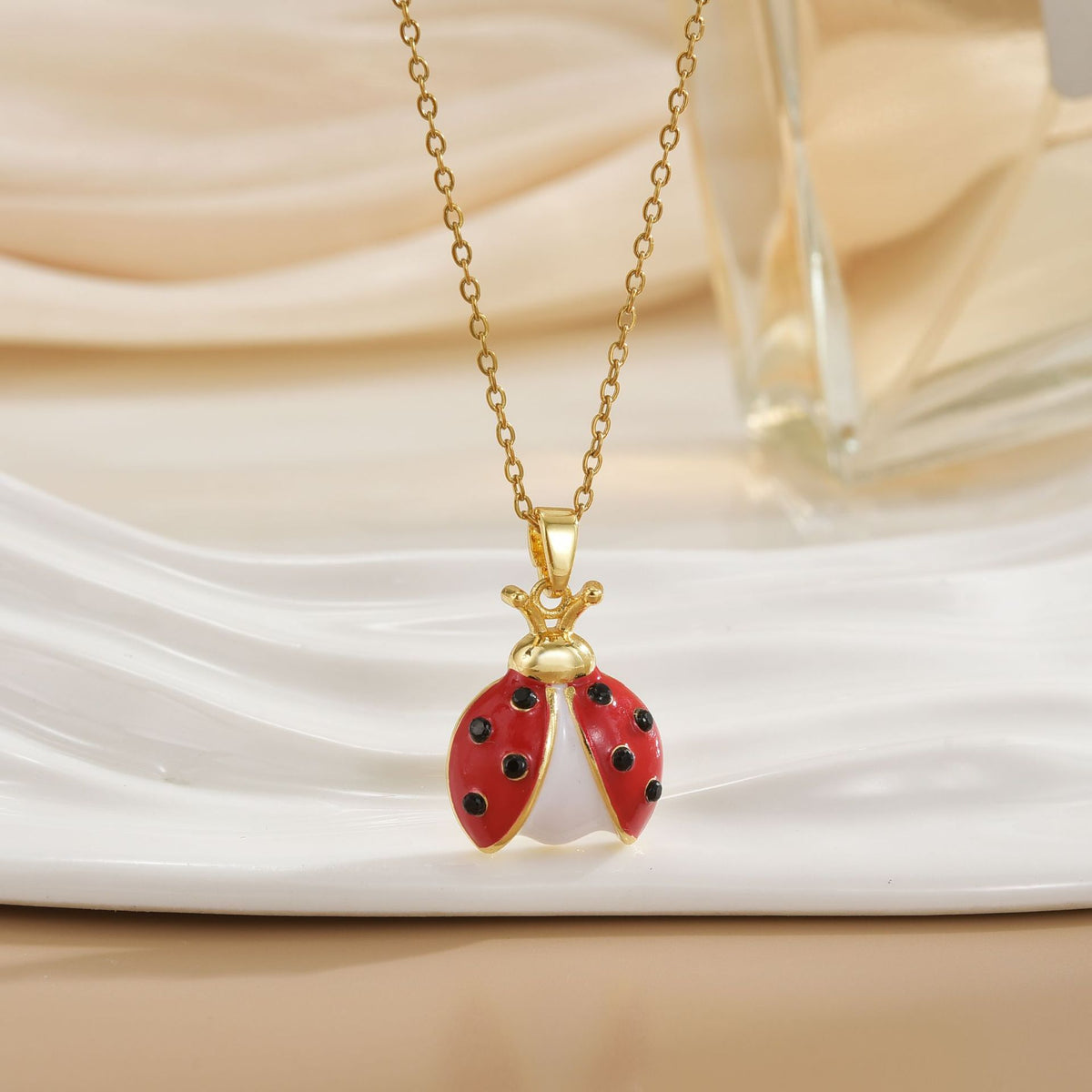 Collana coccinella a sette puntini